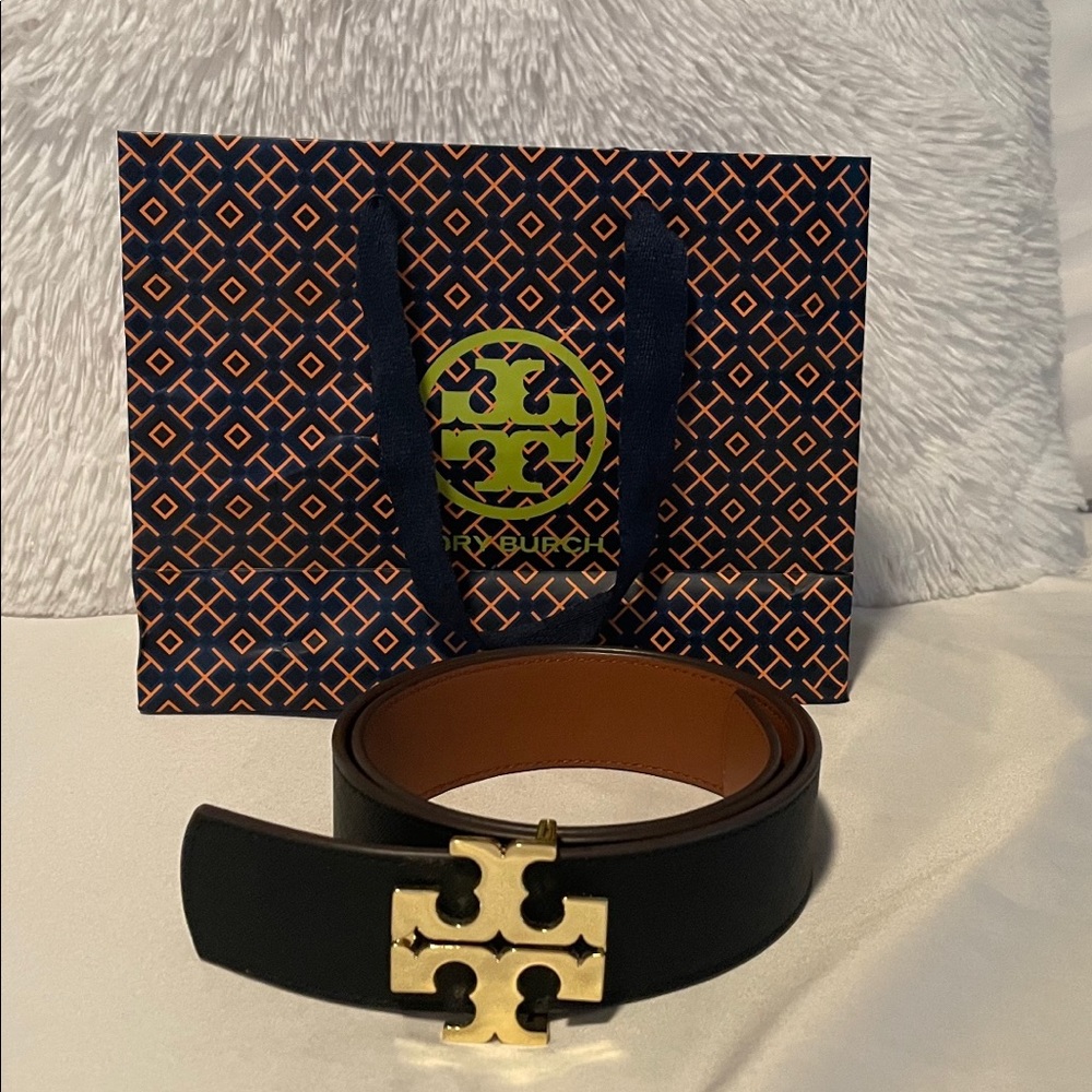 New, never worn Tory Burch Reversible belt.  Black and Tan color.